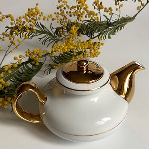 Tetera vintage de Sri Lanka, tetera de porcelana con detalles dorados, pieza clásica para juego de té.
