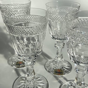 May include: A set of three ceramic mugs with a speckled, matte finish. The mugs are in shades of cream, light gray, and dark gray. Each mug has a simple, minimalist design, perfect for coffee or tea.