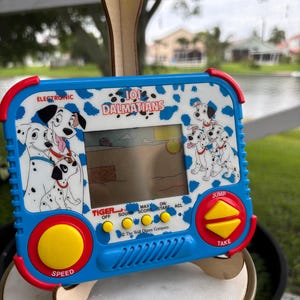 Vintage Disney 101 Dalmatians Tiger Electronics Handheld LCD Game