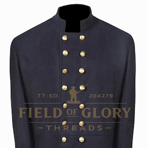 May include: A navy blue coat with a high collar and double-breasted gold buttons. The coat has a long, tailored design and features the text "FIELD OF GLORY - THREADS".