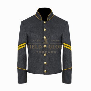 May include: A dark gray jacket with gold trim and buttons. The jacket has yellow stripes on the sleeves and the text "FIELD & GLORY THREADS". The jacket has a high collar and gold buttons down the front.