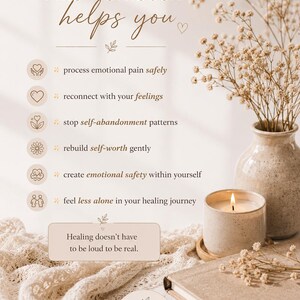May include: A beige workbook with the text "This workbook helps you" and bullet points about emotional healing. A lit candle, vase of flowers, and a book are also in the image. The text "Healing doesn't have to be loud to be real" is also visible.