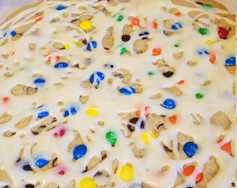 Nancy's famous 12" chocolate chip cookie pizza with m&ms