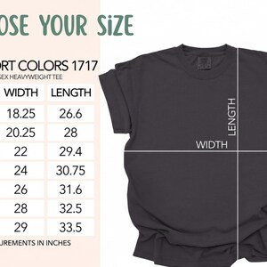 May include: A dark gray short-sleeve t-shirt displayed next to a size chart titled CHOOSE YOUR SIZE. The chart lists COMFORT COLORS 1717 UNISEX HEAVYWEIGHT TEE with width and length measurements in inches for sizes small through 4XL.