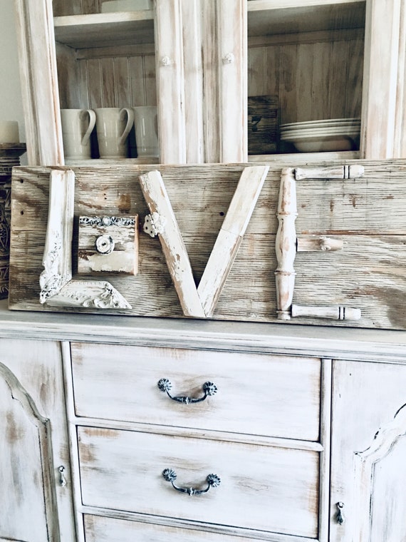 Gorgeous handmade rustic luxe wood LOVE sign by Burlapluxe is a gorgeous example of Nordic French style that could work in a variety of settings.