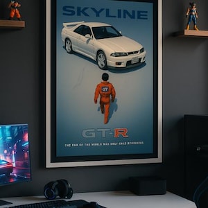 May include: Framed poster featuring a white Skyline GT-R car and a person in an orange jumpsuit. The poster has the word "SKYLINE" at the top and "GT-R" at the bottom. The text "THE END OF THE WORLD WAS ONLY ONE BEGINNING" is also visible.