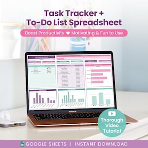 May include: A laptop displays a task tracker and to-do list spreadsheet with a pink and purple color scheme. The screen shows charts and data tables. Text on the screen reads "Boost Productivity" and "Motivating & Fun to Use". A phone and charger are on the table.