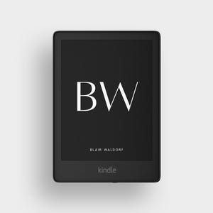 May include: A black Kindle e-reader with a white screen displaying the letters "BW" above the text "Blair Waldorf." The word "Kindle" is printed at the bottom of the device.