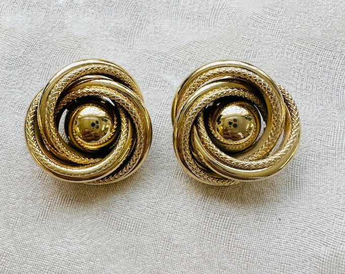 Vintage gold tone knot clip on earrings, 1980s sculptural style, 3.5 cm statement size, bold classic design, timeless gift for her