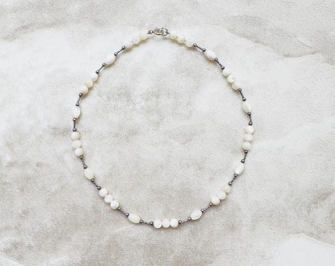 Vintage mother-of-pearl beaded necklace with silver-tone links | 1980s