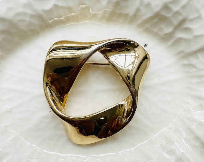Gold-tone sculptural swirl brooch, signed BJ, vintage 1980s designer-style state