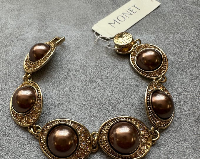 1990s Monet bracelet with chocolate faux pearls and diamanté accents, gold plated vintage link design, signed with original tag