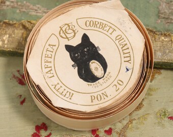 Antique cat face empty ribbon roll empty paper display  French sewing small boudoir english  victorian