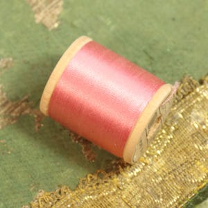 1 vintage pure silk thread 2066 spool warm pink shade 100 yards size A  antique sewing fly trying doll dress flapper millinery