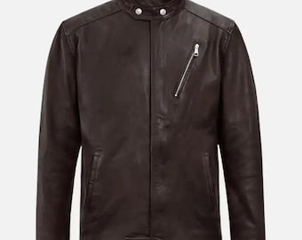 May include: A dark brown leather jacket with a stand-up collar and a diagonal zipper pocket on the chest. The jacket has a classic design with a button closure at the waist and two buttons at the collar.