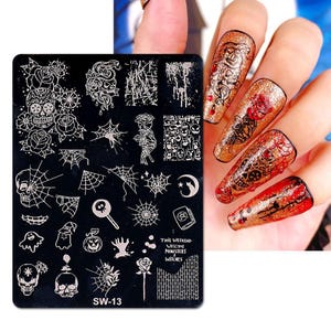 May include: Black nail art stamping plate with various Halloween-themed designs, including skulls, spiderwebs, and pumpkins. The plate also features the text "THIS WEEKEND WELCOME MONSTERS & WITCHES" and the code "SW-13".