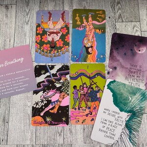 May include: Five tarot cards with colorful illustrations and text. The cards are laid out on a wooden surface. The text on the cards includes "Knight of Swords", "There is nothing sexier than my authentic truth", "When I merge my desire with faith, I can take action from a place of peace rather than control", and "Square Breathing: Inhale Calm | Exhale Negativity".