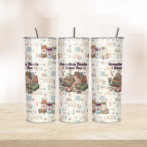 May include: Three stainless steel tumblers with lids and straws. Each tumbler features a repeating pattern of books, jars, and coffee cups. The text "Grandma Reads Smut Too" is printed on the center tumbler.