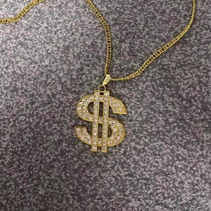 Gold Dollar Sign Pendant Necklace – Iced Out Bling Chain, Hip Hop Costume Jewelry, Rapper Style Statement Accessory