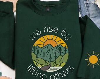 We Rise By Lifting Others Sweatshirt | Inspirational Graphic Crewneck - Cozy Nature Mountain Pullover - Positive Quote Gift for Women