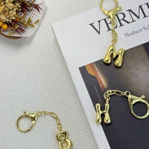 Llavero con letra de burbuja, 26 letras en inglés, colgantes para equipaje, colgantes para llaveros con letras, accesorios para bolsos de hombre y mujer