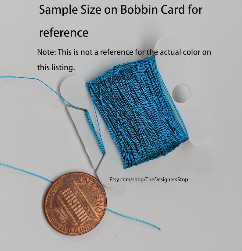 May include: A close-up of a teal blue embroidery floss wound around a bobbin card. A US penny is included for size reference. The text "Etsy.com/shop/TheDesignersStop" is printed on the card.