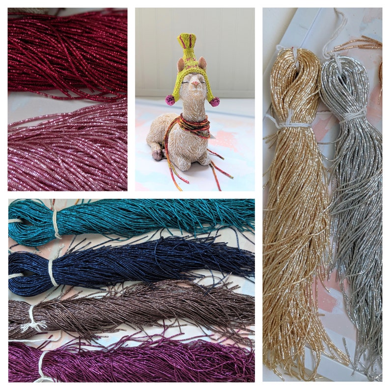 May include: Assortment of metallic seed beads in various colors, including teal, navy, brown, burgundy, gold, and silver. The beads are arranged in bundles and are ready for crafting projects.
