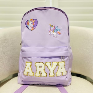 Sac à dos avec nom personnalisé, cartable avec écusson avec lettre, cadeau d'anniversaire pour enfants, cadeau de rentrée pour les enfants, sac à dos violet