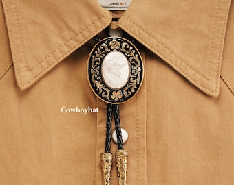 Cravatta Bolo nera e oro con motivo floreale, collana da cowboy western, cravatta vintage ovale in madreperla, gioielli da uomo del sud-ovest, regalo per gli sposi