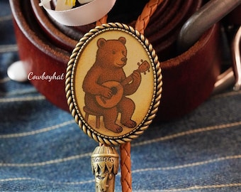 Corbata de bolo de oso: corbata de vaquero vintage con guitarra