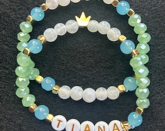 Pulseras de la amistad de la Princesa Tiana (juego de 2) con dije de corona dorada