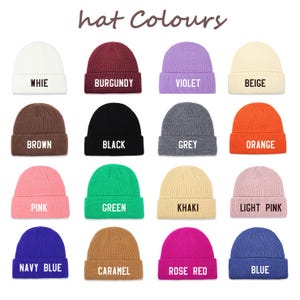 May include: A grid of sixteen beanies in various colors, including white, burgundy, violet, beige, brown, black, grey, orange, pink, green, khaki, light pink, navy blue, caramel, rose red, and blue. Each beanie has its color name printed in white.
