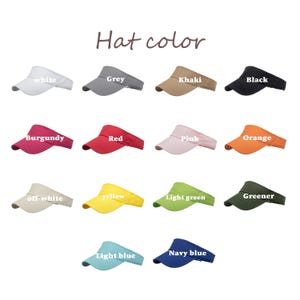 K&ouml;nnte beinhalten: Eine Auswahl an Sonnenblenden in verschiedenen Farben: Wei&szlig;, Grau, Khaki, Schwarz, Burgunderrot, Rot, Rosa, Orange, Off-White, Gelb, Hellgr&uuml;n, Dunkelgr&uuml;n, Hellblau und Marineblau. Der Text "Hat color" ist oben zu sehen.