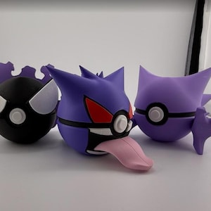 May include: Three purple and black Pokemon figures. The figures are of the Pokemon Ghost, Haunter, and Gengar. The figures are made of a soft, pliable material.