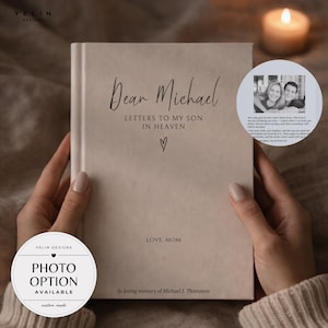 May include: A beige hardcover journal titled Dear Michael Letters to My Son in Heaven with a small heart icon, Love, Mom, and In loving memory of Michael J. Thompson printed on the front cover. The journal features a custom photo insert option.