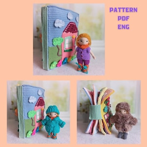 May include: A collection of handmade crochet items, including a blue book with a house design, dolls, and a bundle of colorful fabric. The text "PATTERN PDF ENG" is visible. The dolls are dressed in various outfits, showcasing the versatility of the crochet patterns.