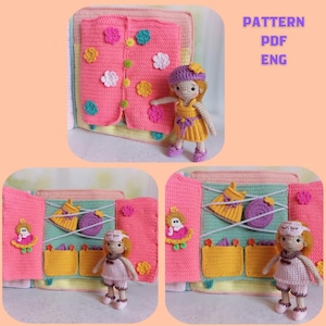 May include: A handmade crochet doll with a yellow dress and purple hat stands next to a pink crochet book with colorful flower embellishments. The book has a button closure and a variety of crochet elements. Text on the image reads "PATTERN PDF ENG".