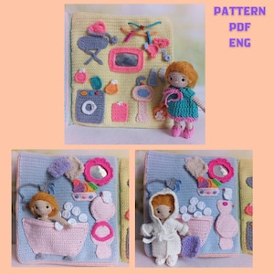 May include: Crocheted bathroom-themed quiet book with a doll. The book features a yellow background with various bathroom elements like a sink, mirror, and washing machine. The doll is wearing a turquoise dress. The text "PATTERN PDF ENG" is visible.