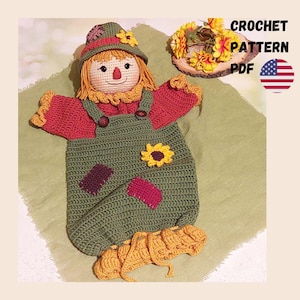 May include: A crochet scarecrow doll pattern PDF featuring a doll with a green hat, yellow hair, and a red shirt under green overalls with patches and a sunflower. The text CROCHET PATTERN PDF and a small United States flag are visible.