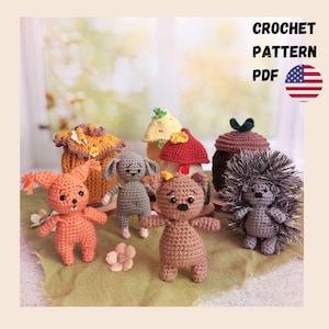 May include: A selection of handmade crochet animal figures, including a squirrel, bear, hedgehog, and a rabbit. The figures are in various colours, such as orange, grey, and brown. The image also includes crochet mushroom-shaped items. Text on the image reads "CROCHET PATTERN PDF".