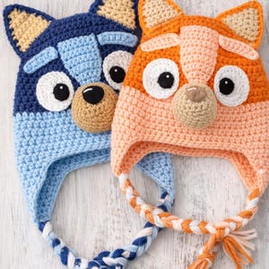 May include: A white ceramic mug with a black handle and the text "But First, Coffee" in a handwritten style. The mug is on a white surface. The mug is 4 inches tall.