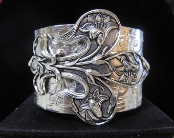 Fleur-de-Lis  set on a Hammered and Stamped Aluminum Wide Cuff - Neo  Victorian