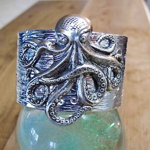 Octopus on a Stamped Aluminum 1 1/2 inch Cuff