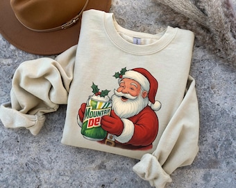 Christmas Mountain Dew Santa Shirt, Mtn Dew Crewneck, Soda Lover Hoodie, Mountain Dew Logo Sweatshirt, Gift for Mtn Dew Lover, a236