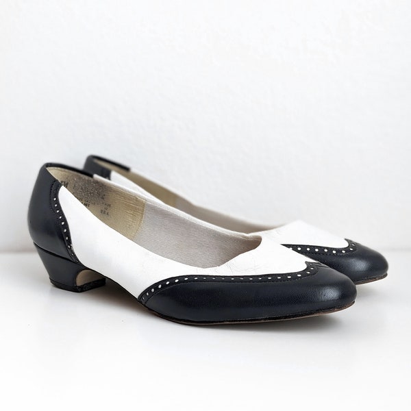spectator pumps black white