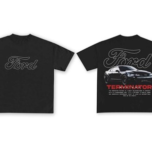 May include: Black t-shirt with a white outline of the Ford logo on the front and a black Ford Mustang with the text "Terminator Mustang" on the back.