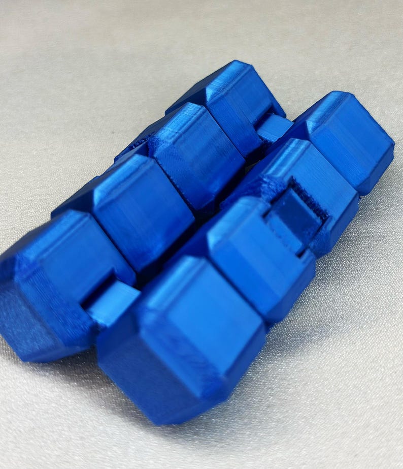 3D-utskriven Infinity Fidget-kub – vikbar stresslindrande leksak i blått bild 2