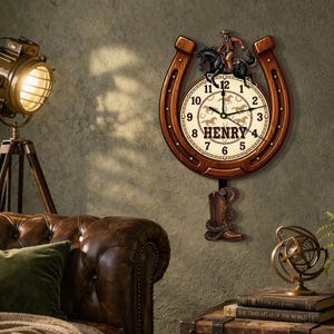 May include: A wooden horseshoe-shaped wall clock with a cowboy and horse design. The clock face has the name "HENRY" and horse silhouettes. A cowboy boot pendulum hangs below. The clock is mounted on a textured wall.