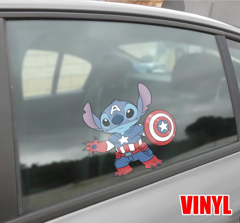 May include: A blue and red vinyl decal of Stitch dressed as Captain America, holding a shield with a star. The decal is applied to a car window. The word "VINYL" is printed in red.