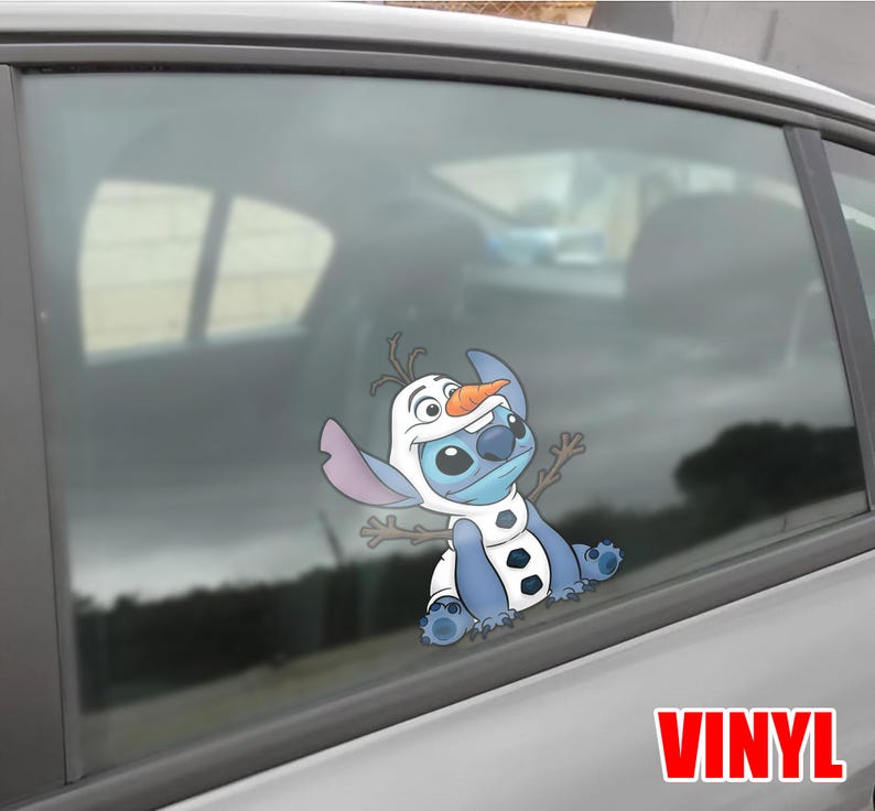 May include: A blue and white vinyl decal of the character Stitch dressed as Olaf from Frozen. The decal is applied to a car window. The word "VINYL" is printed in red at the bottom right.